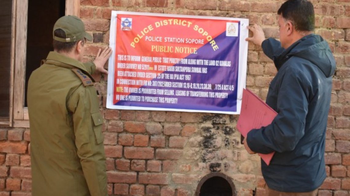 India’s Shameful Land Grab: State Forces Seize Properties of Two Kashmiris in Sopore to Crush Resistance