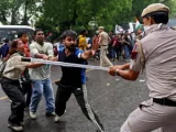 Reuters Reports Delhi Police Assault Protesting Students Demanding Exam Reforms and Resignation