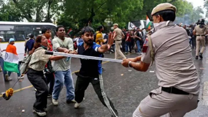 Reuters Reports Delhi Police Assault Protesting Students Demanding Exam Reforms and Resignation