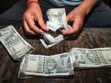 Indian Rupee Weakens Near Record Low of 96 Per Dollar as Foreign Capital Outflows Reach 30 Billion Dollars